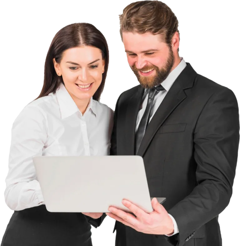Two smiling business professionals looking at a laptop, demonstrating collaboration.